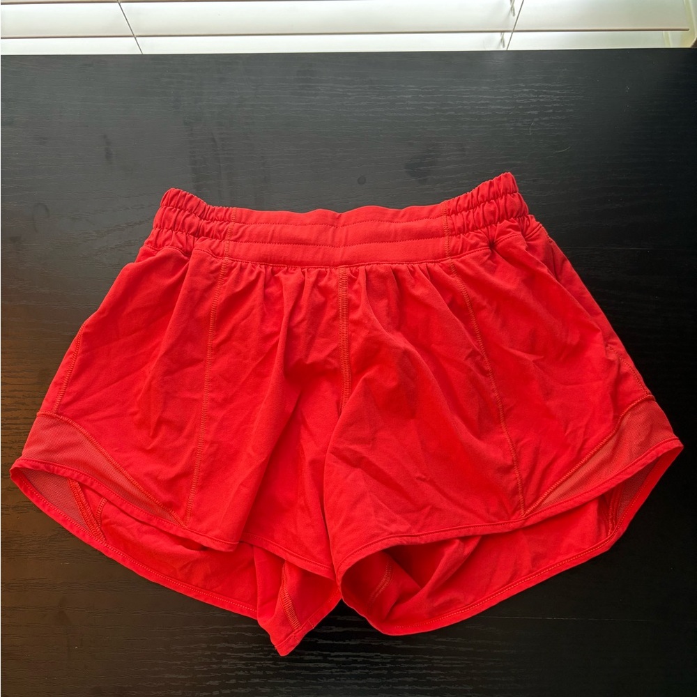 Bright red/orange lululemon shorts